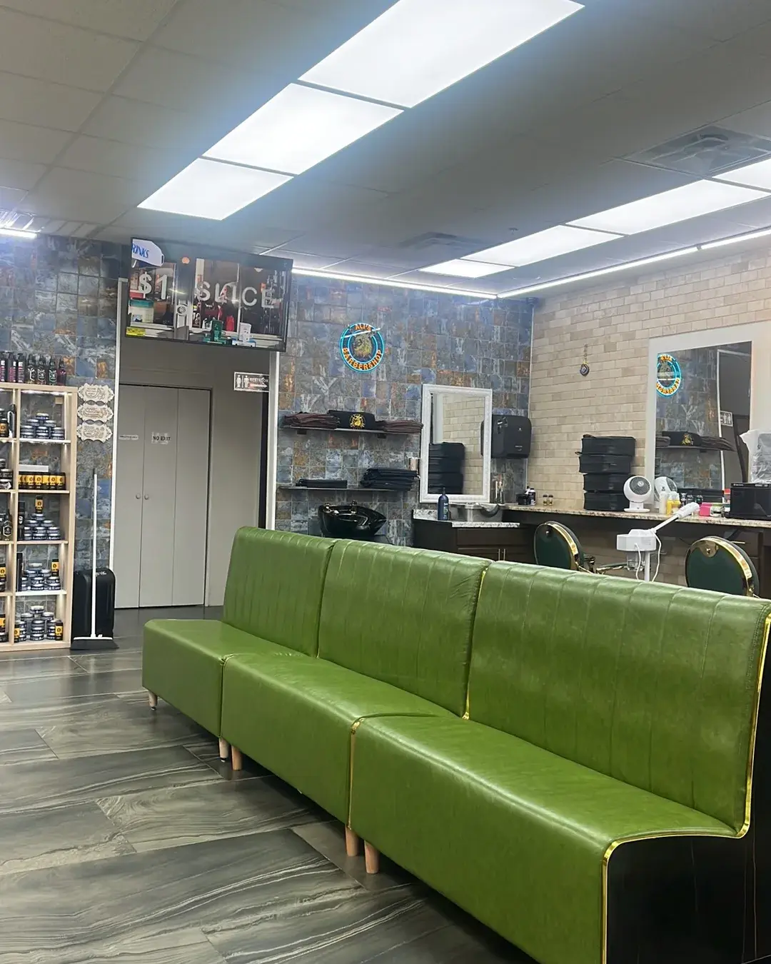 The green leather benches in the waiting area
